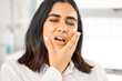 © ChasingMagic/peopleimages.com - Woman, toothache and mouth pain in home for cavity, tooth infection or dental emergency. Gums, healthcare and female person with hand on face for oral hygiene, inflammation or gingivitis problem