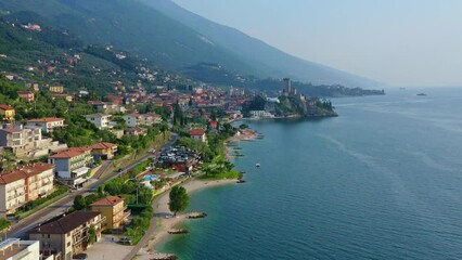 Wall Mural - Scaligerburg Malcesine Lake Garda Aerial View with Castle, Scenic Blue Water and Mountains, Idyllic Summer Vacation Destination, Clear Sky and Historical Town Background