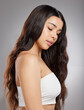 © peopleimages.com - Beauty, cosmetics and hair with natural woman in studio on white background for keratin treatment. Aesthetic, growth and shampoo with confident model at salon for clean, organic or strong haircare