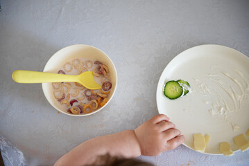 Top view of a toddler eating