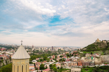 Wall Mural - Church of St. Nicholas in Tbilisi, Georgia. View of the Georgian city of Tbilisi and the Church of St. Nicholas from a high point.