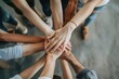© MadMouse - Teamwork concept. Close up of business people putting their hands together.