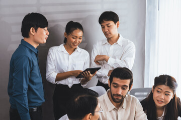 Wall Mural - Group of diverse office worker employee working together on strategic business marketing planning in corporate office room. Positive teamwork in business workplace concept. Prudent