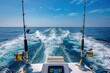 © Jahid CF 5327702 - Trolling fishing boat rod and golden saltwater reels deep blue ocean sea wake