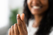 © Egoitz - Closeup of black woman's fingers doing heart or love shape. Valentine concept