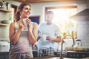 Poster - Woman, happy and thinking with coffee in kitchen for daily morning routine, peace and calm for comfort. Girl, beverage and thoughts in home with man or quiet moment, contemplation and mindfulness.