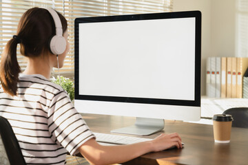 businesswoman using computer and hand type on the keyboard, mockup screen of advertisement.