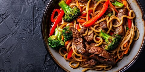 Wall Mural - A bowl of stir fry with meat and vegetables