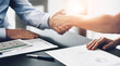 © peopleimages.com - Business people, handshake and meeting in agreement with contract, greeting and partnership. Thank you, collaboration and document, support for B2B and introduction and deal for recruitment at work