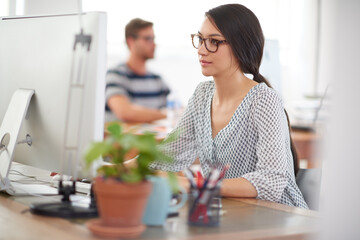 Creative, startup or woman on computer for information technology, problem solving or online firewall. IT tech reading, programming upgrade or typing for troubleshooting or solution for career