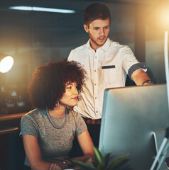 Discussion, woman and partner on computer at night office for information, research and teamwork for project management. People, man and pc with planning, support and overtime for proposal solution