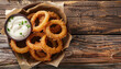 © Shahid - Onion rings deep fried with crispy crust generated.Ai