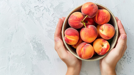 Wall Mural - Fresh Ripe Peaches in Hands - Organic Fruit with Copy Space Stock Photo