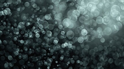 Fototapete - A blurry image of a dark background with many small circles. The circles are of different sizes and are scattered all over the image. The image has a dreamy and ethereal quality to it