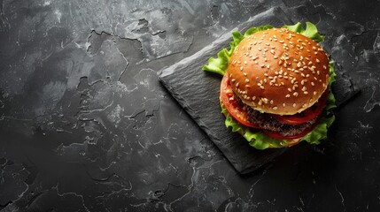 Wall Mural - Burger image on a dark slate backdrop