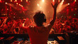 © Ramses - rear view of a dj mixing at great festival party , with crowd of people in background