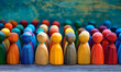 © Creative mind - Multicolored wooden figures for concept of diverse people and society.