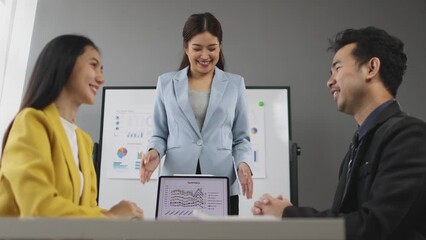 Wall Mural - Colleagues shaking hands in business meeting.