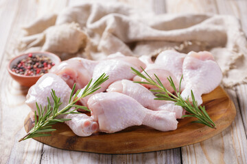 Wall Mural - fresh chicken legs with rosemary