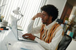 © DragonImages - Exhausted entrepreneur stressed after difficult online meeting