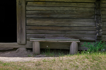 Poster - Wooden bench at the old house.