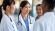 © arayabandit - Young Asian female doctors collaborate, discussing treatment options together, pooling their expertise and insights to provide comprehensive and compassionate care in a supportive healthcare environme
