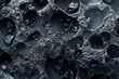 © CHONCHANOK PHOTO - Close-up of activated carbon particles, front view, porous texture, futuristic tone