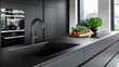© JP STUDIO LAB - Stylish black kitchen with matte black cabinets, spacious island with integrated sink and cooktop, luxury appliances, minimalist decor, and large windows allowing natural light