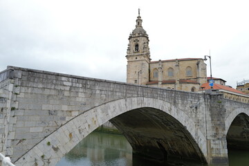 Wall Mural - Bridge and church in the old town of Bilbao