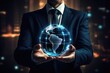 © Pee - Businessman holding a glowing digital globe, representing global connectivity, technology, and innovation in a futuristic urban setting.