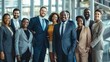 © MD Media - A diverse group of businesspeople stand together, smiling and looking confident in an office setting. business professionals stands confidently with arms crossed, showcasing collaboration and success
