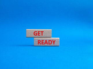 Wall Mural - get ready symbol. wooden blocks with words get ready. beautiful blue background. business and get re