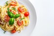 © Mayatnikstudio - Capellini Pasta Dish with Cherry Tomatoes, Basil, and Parmesan Cheese
