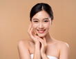 © Aleksandr Matveev - A woman with long brown hair and a white tank top is smiling and making a face. She is wearing makeup and has a light skin tone