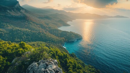 Wall Mural - Nature background from a high angle mountain view of surrounding natural landscape sea trees and rocks for adventure tourism