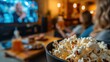 © Julien - Close-Up of Popcorn Bowl in Living Room During Movie Night