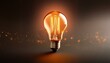 © Creative Light - Warm, active light bulb on dark background