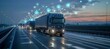 © Georgii - Futuristic cargo trucks on the highway at dusk with technology network connections
