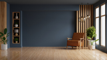 Wall Mural - Living room with leather armchair on wood flooring and dark blue wall- 3D rendering