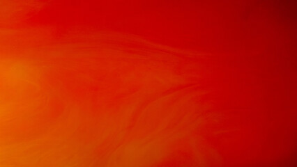 Vapor floating. Paint water. Defocused vibrant red orange color mist flow abstract art background with copy space.