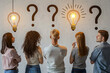 © Emanuel - People deep in thought with question marks and light bulb above, representing ideas and problem-solving