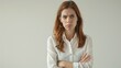 © Adi - sad office girl, europe woman sulking and frowning disappointed, standing upset and distressed against white background
