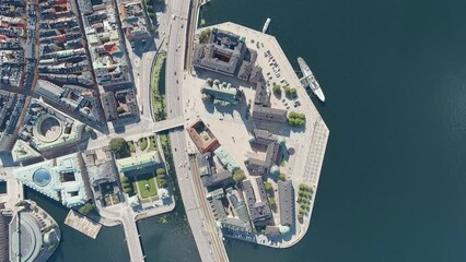 Wall Mural - Stockholm, Sweden. Island Riddarholmen and Lake Malaren. Riddarholmen Church. Panorama of the city. Summer day, Aerial View, HEAD OVER SHOT with rotation