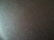 © Udomner - Authentic black leather showing fine and coarse grains