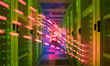 © Westend61 - Colorful network waves traveling inside of data center