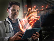 © Westend61 - Doctor examining human heart on tablet with help of augmented reality