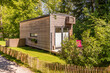© Westend61 - Germany, Baden-Wurttemberg, Schorndorf, Exterior of tiny wooden house in summer