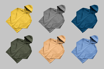 Wall Mural - Mockup of colored hoodies oversize, diagonal presentation front view, sweatshirt with hood, pocket, isolated on gray background. Set