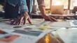 © Amorn - Strategic Business Planning Concept - Close-up of Person's Hands Holding Business Plan Document