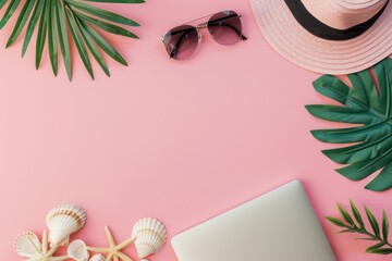 Fototapete - A pink background with a laptop, sunglasses, and a hat